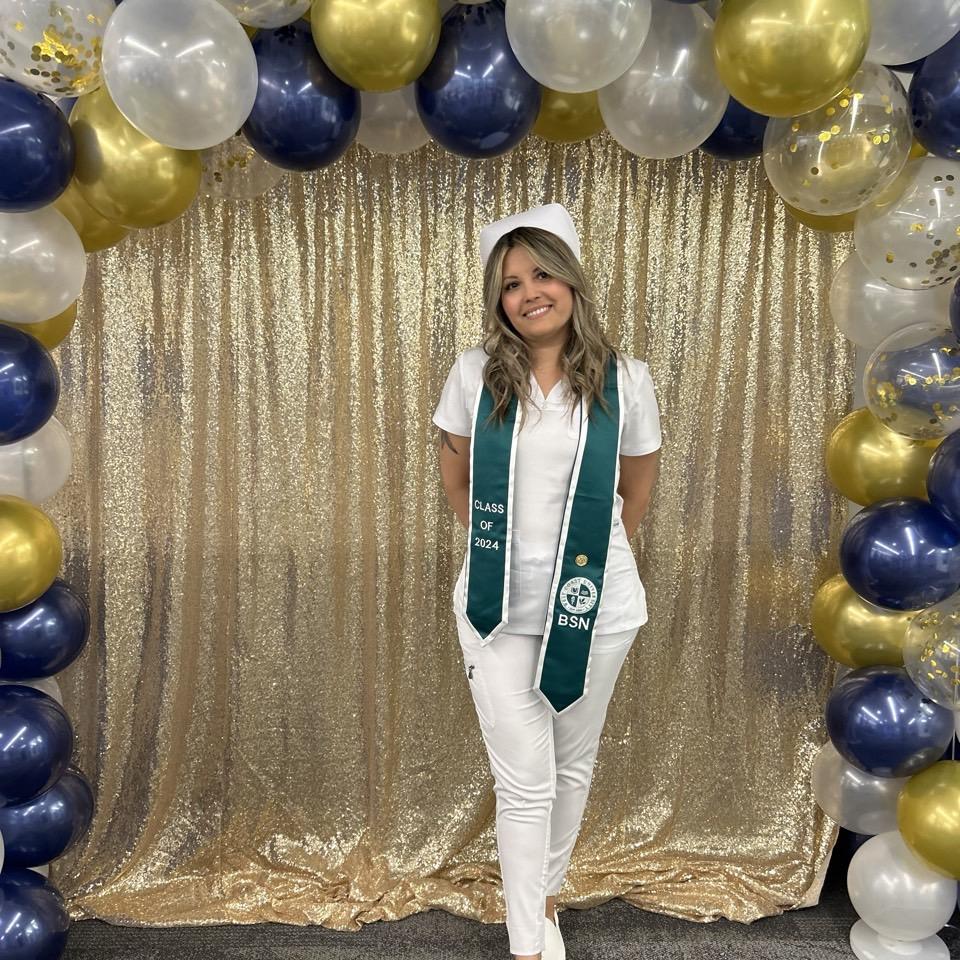 Photo of single mom nursing student graduating